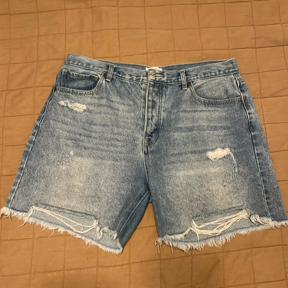 Distressed denim shorts